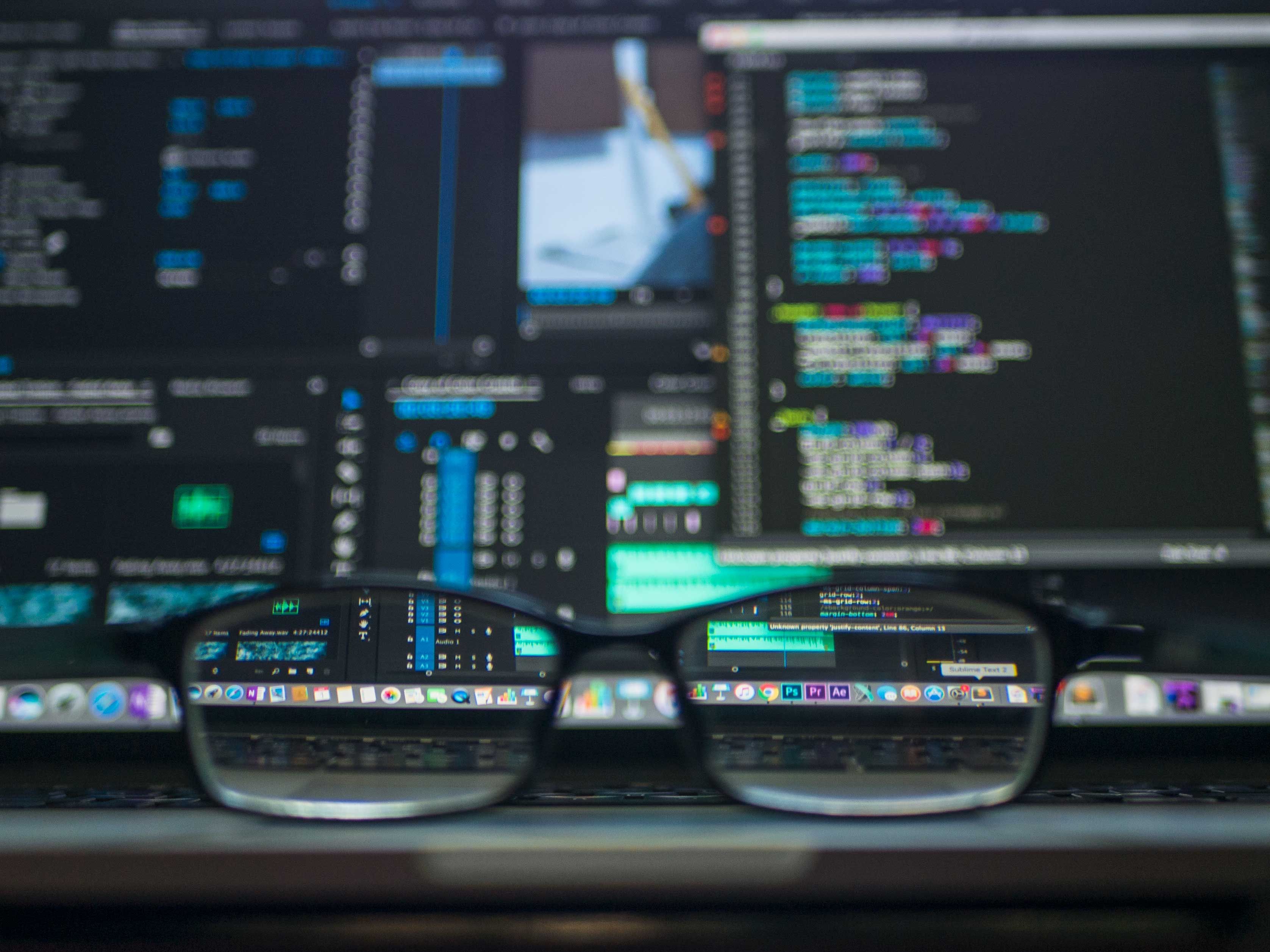 Data codes through eyeglasses representing cybersecurity