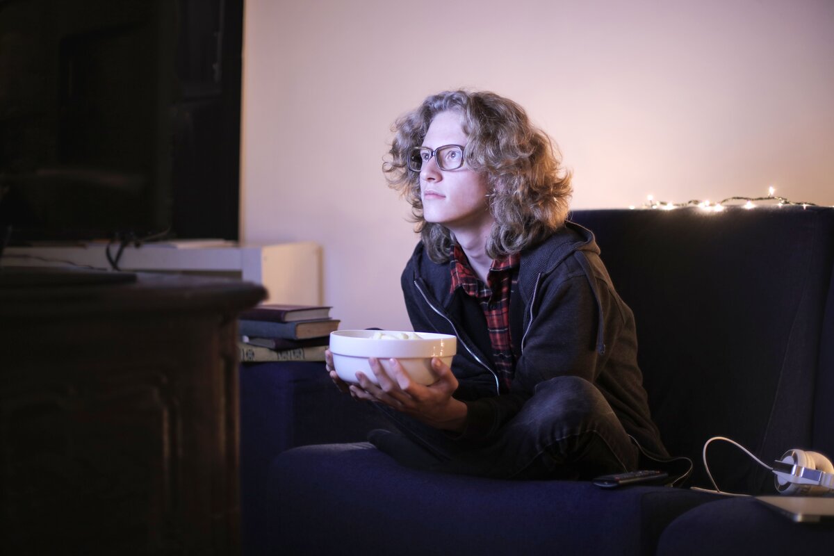 Person enjoying premium home entertainment